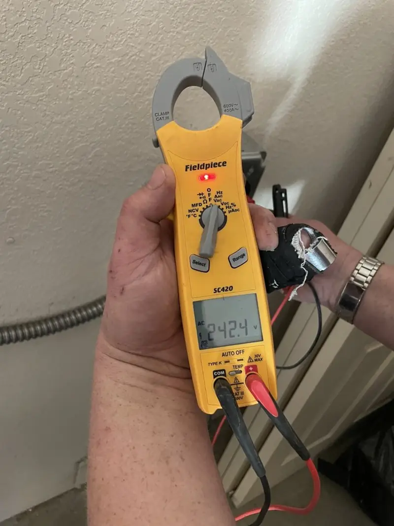 Voltage testing with clamp meter during Generator Installation in Montague